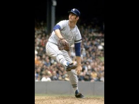 The Cooperstown Snubs That Still Sting 6 Tommy John pitching during a game, showcasing the longevity his namesake surgery afforded.