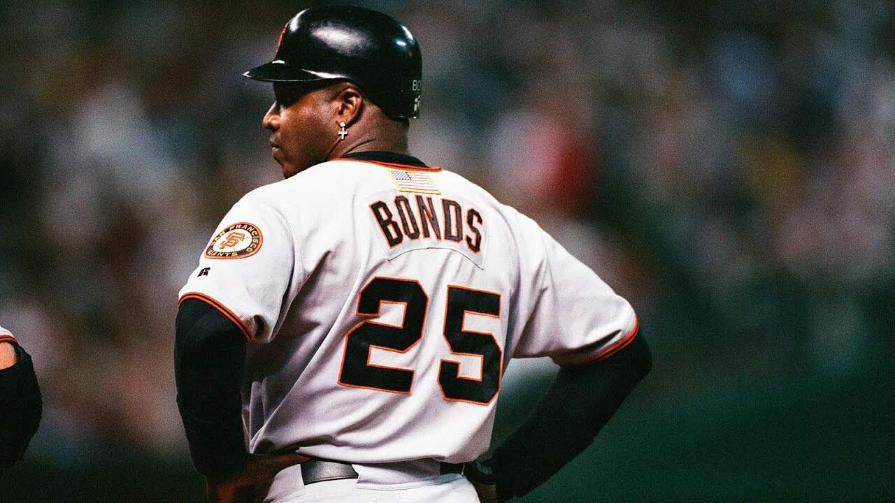 Like Father, Like Son: Baseball's Greatest Dynasties 3 Image of Barry Bonds showcasing key moments as baseball's home run king during the steroid era.