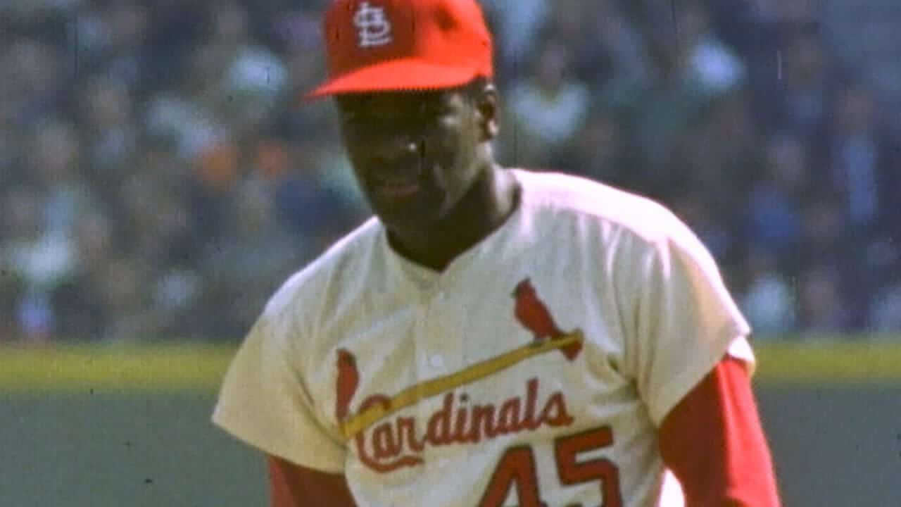 12 Pitchers Built to Beat Any Era 5 Image of Bob Gibson, showcasing his fierce pitching style in the 1960s.
