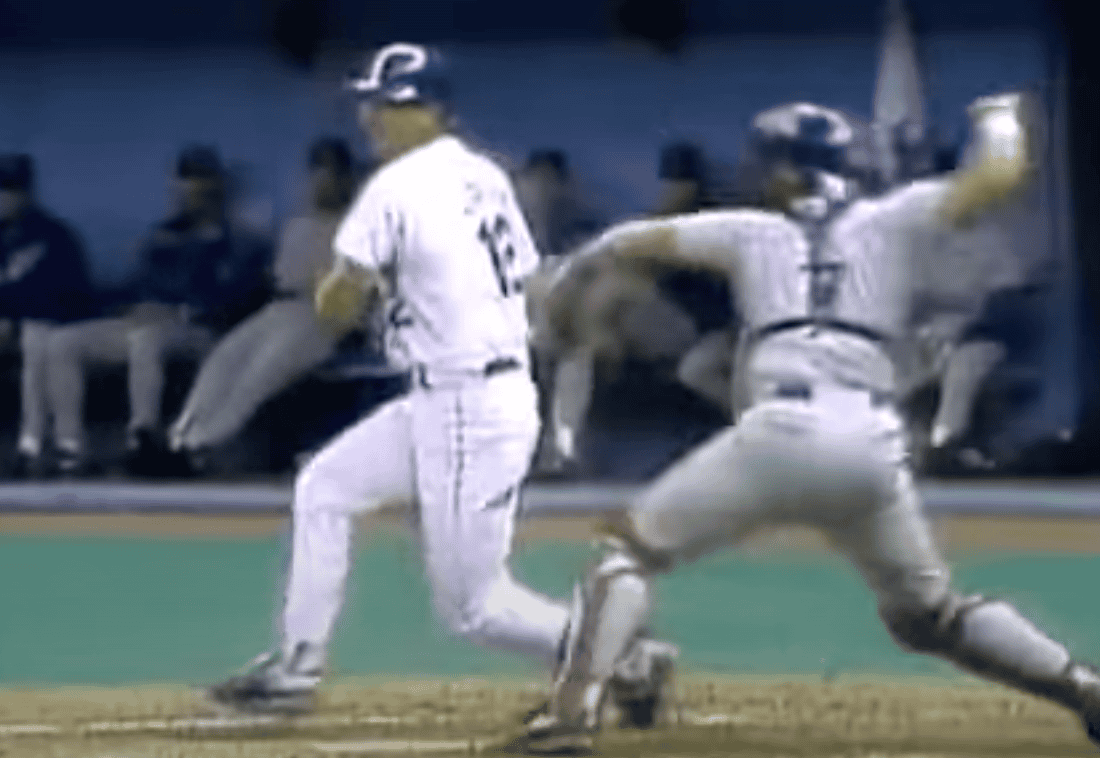Iconic image of Ivan Rodriguez, showcasing his skills as one of baseball's greatest catchers.