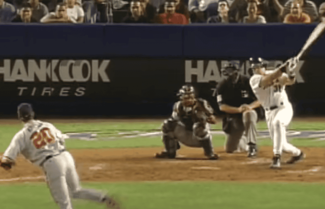 Image of Mike Piazza, showcasing his batting prowess as a legendary hitting catcher.