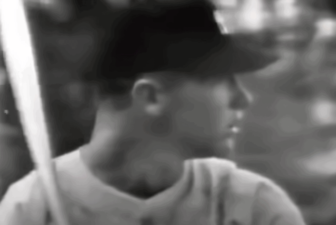 Image of Mickey Mantle showcasing his clean power hitting style in baseball.