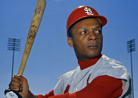 8 Games That Quietly Bent the Arc of Baseball 5 Curt Flood in action, showcasing his skills as a game-changing center fielder.