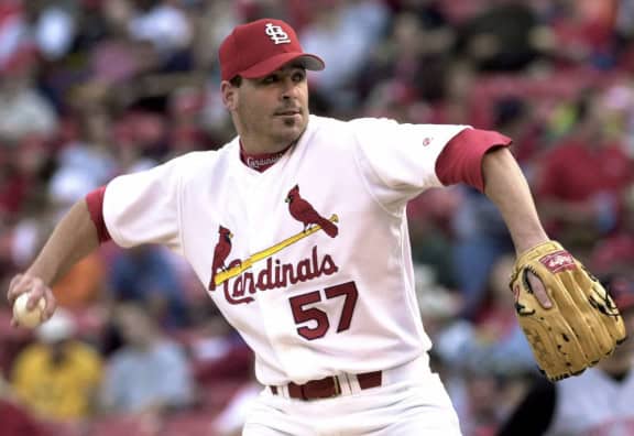 Darryl Kile in action, a veteran leader remembered in "12 Baseball Legends Who Left the Diamond Too Soon."