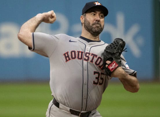 The 10 Players Who Defined 2010s Baseball 7 Justin Verlander delivering a pitch, showcasing his skill as an ace in the 2010s.