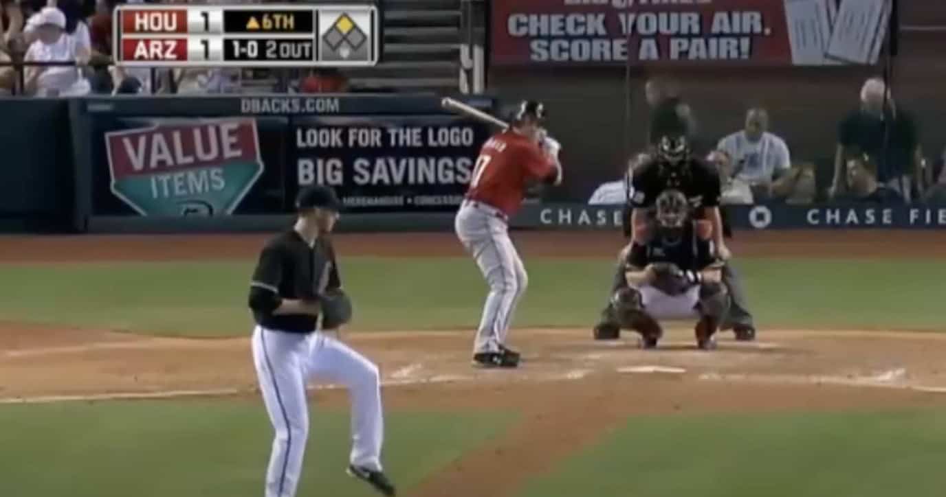 Lance Berkman showcasing his hitting prowess as a switch hitter in MLB.