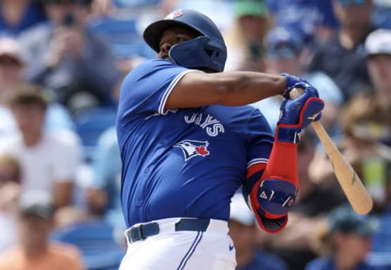 Walk-Up Anthems That Became Part of the Game 16 Vladimir Guerrero Jr. hitting a home run, showcasing his power as a 2025 MVP candidate.