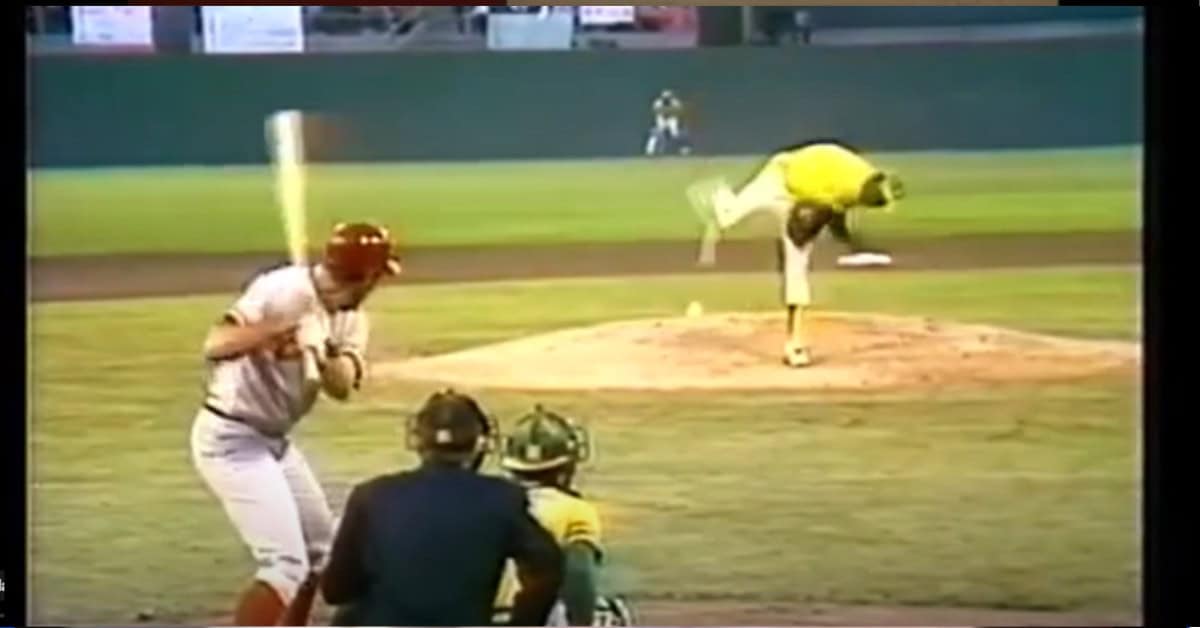 Rain Delay Masterpieces 3 A's pitcher throws a fast pitch to a Reds Batter