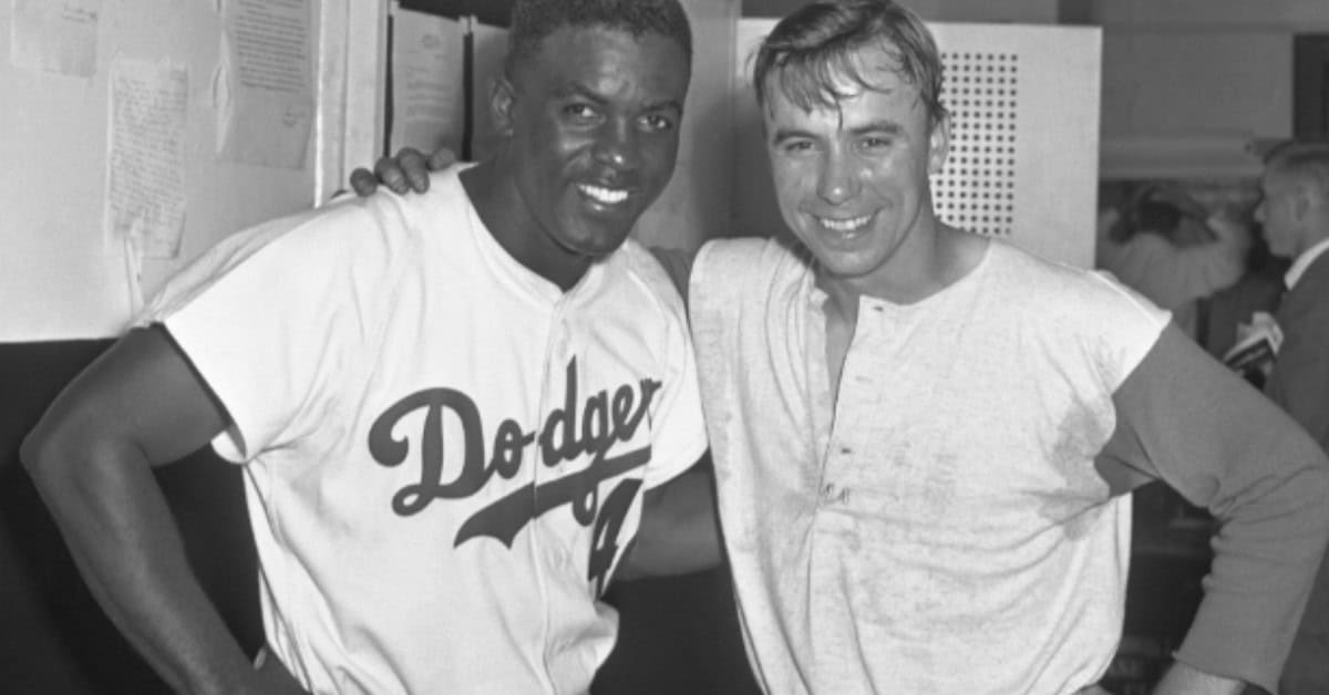 Jackie Robinson and Pee Wee Reese in action, showcasing their iconic double play.