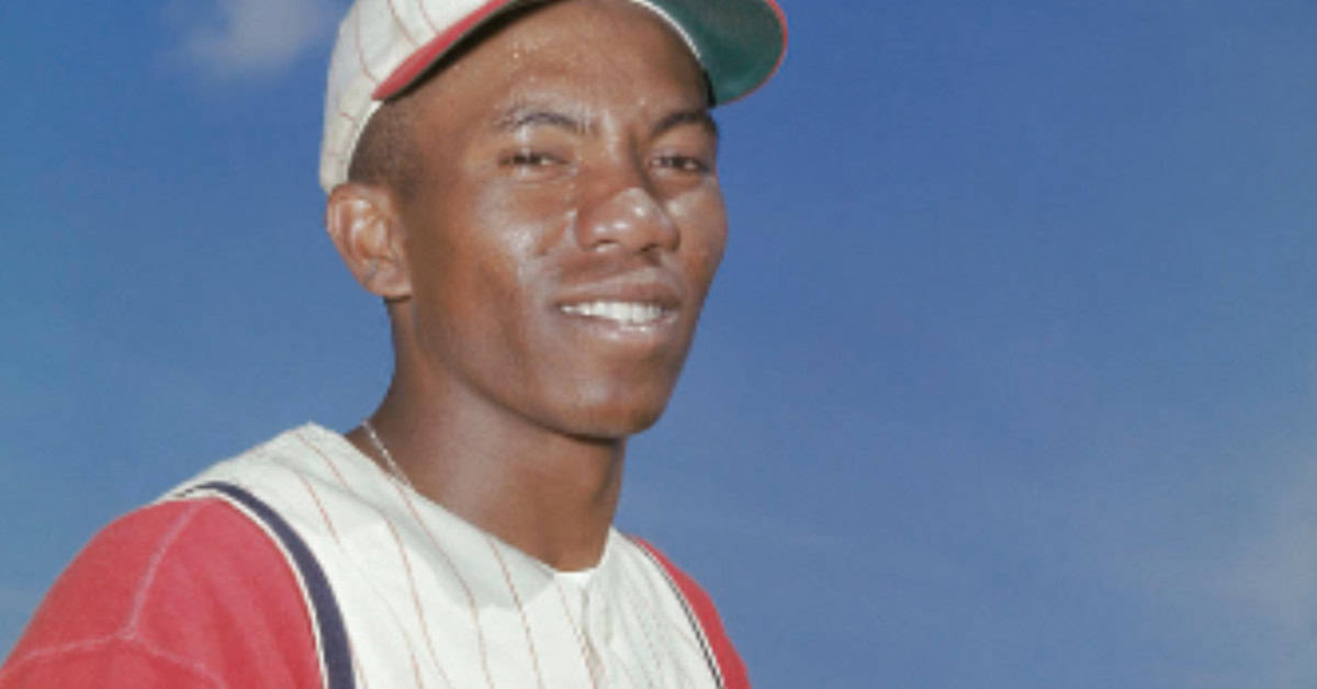 Meet the 20 Shortstops Who Defined a Decade at Second and Short 19 Leo Cardenas in action, showcasing his skills as a legendary shortstop from the '60s.
