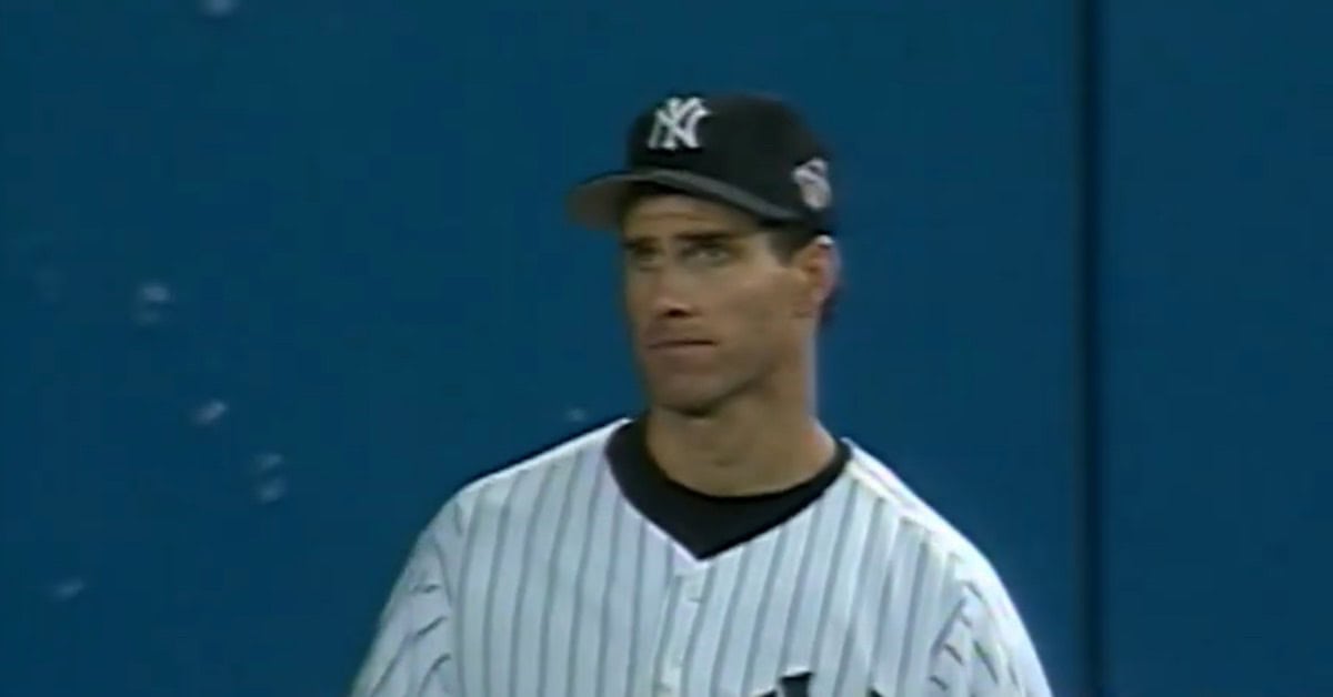 27 Yankees Who Made the Pinstripes Mean Something 11 Paul O'Neill in action, representing his passion for the Yankees' legacy.