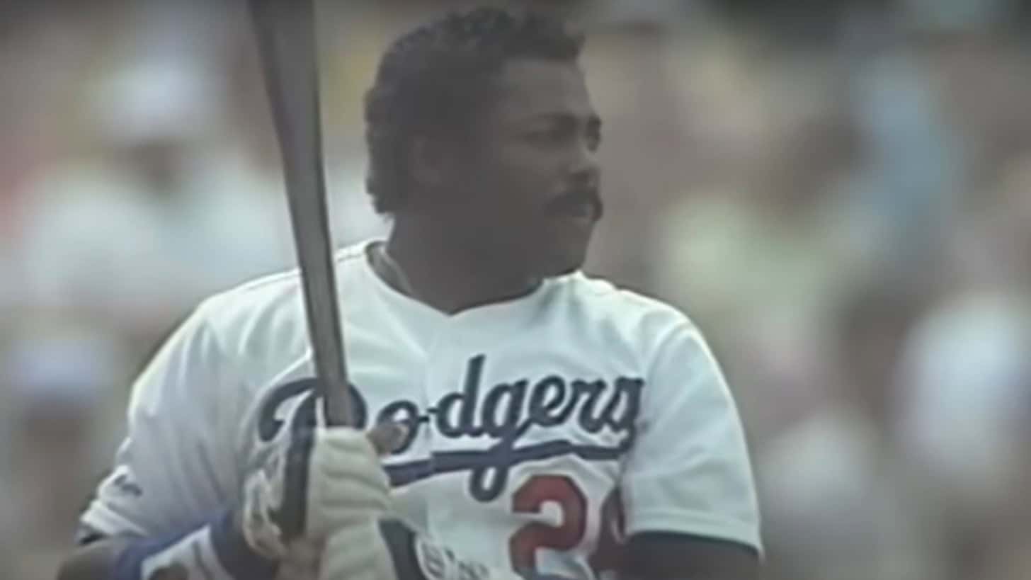 The Left Fielders Who Owned the '80s 12 Pedro Guerrero at bat, representing the sizzling talent of '80s outfielders.