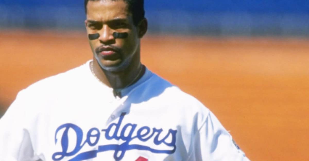 Meet the Only True Five-Tool Players the Game Has Seen 11 Raúl Mondesi showcasing his powerful arm, deterring runners in the 90s.