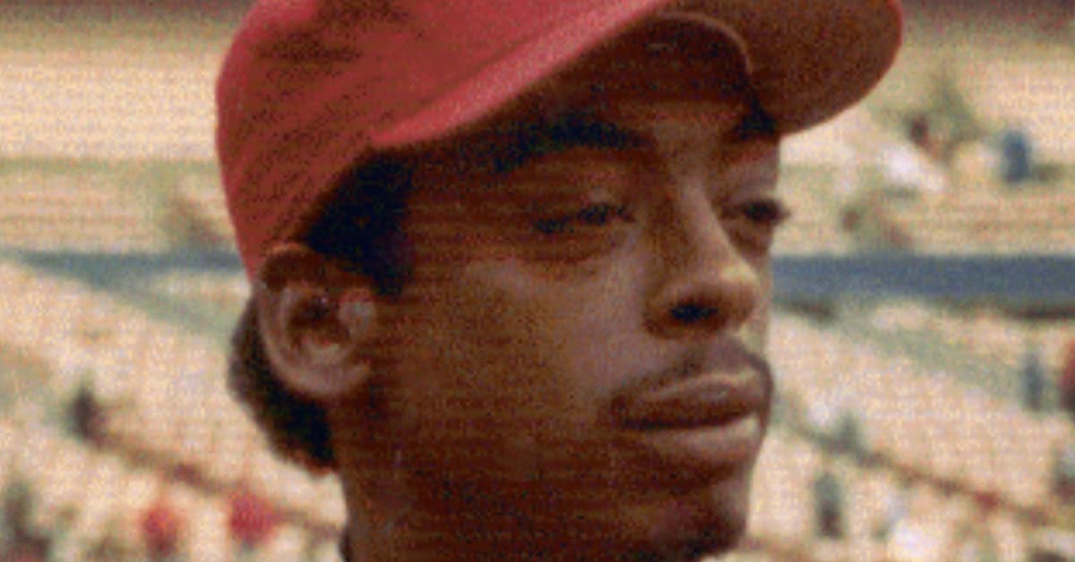 10 MVPs Who Dominated an Era and Then Vanished 5 Willie McGee in action, showcasing his skills as a top 1980s centerfielder.