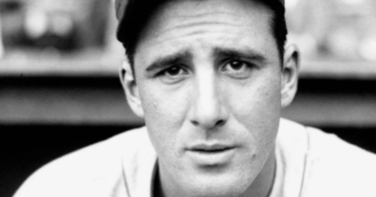 Hank Greenberg in action during the iconic 1938 home run chase, showcasing his legendary stats.