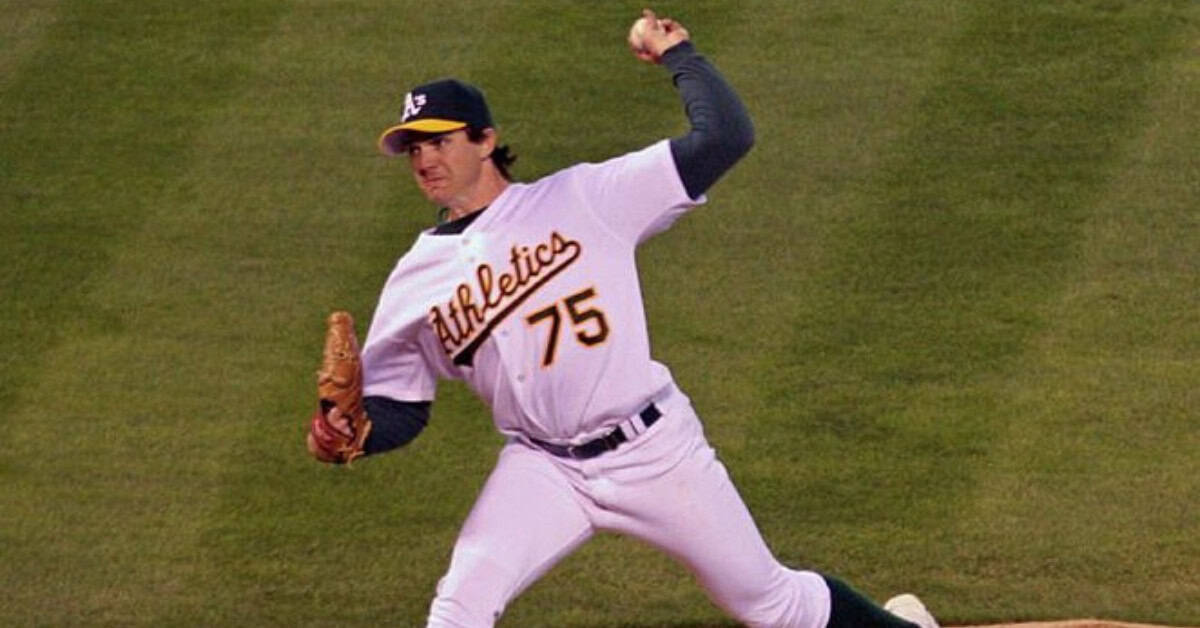 10 Curveballs That Made the Best Hitters in MLB Look Lost 9 Barry Zito showcasing his signature curveball during a game for the A's.