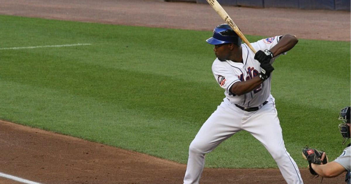 Carlos Delgado in action, highlighting his impact as a Mets slugger.