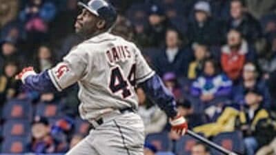 Chili Davis, a feared switch-hitter, stands poised at the plate, ready to face pitchers.