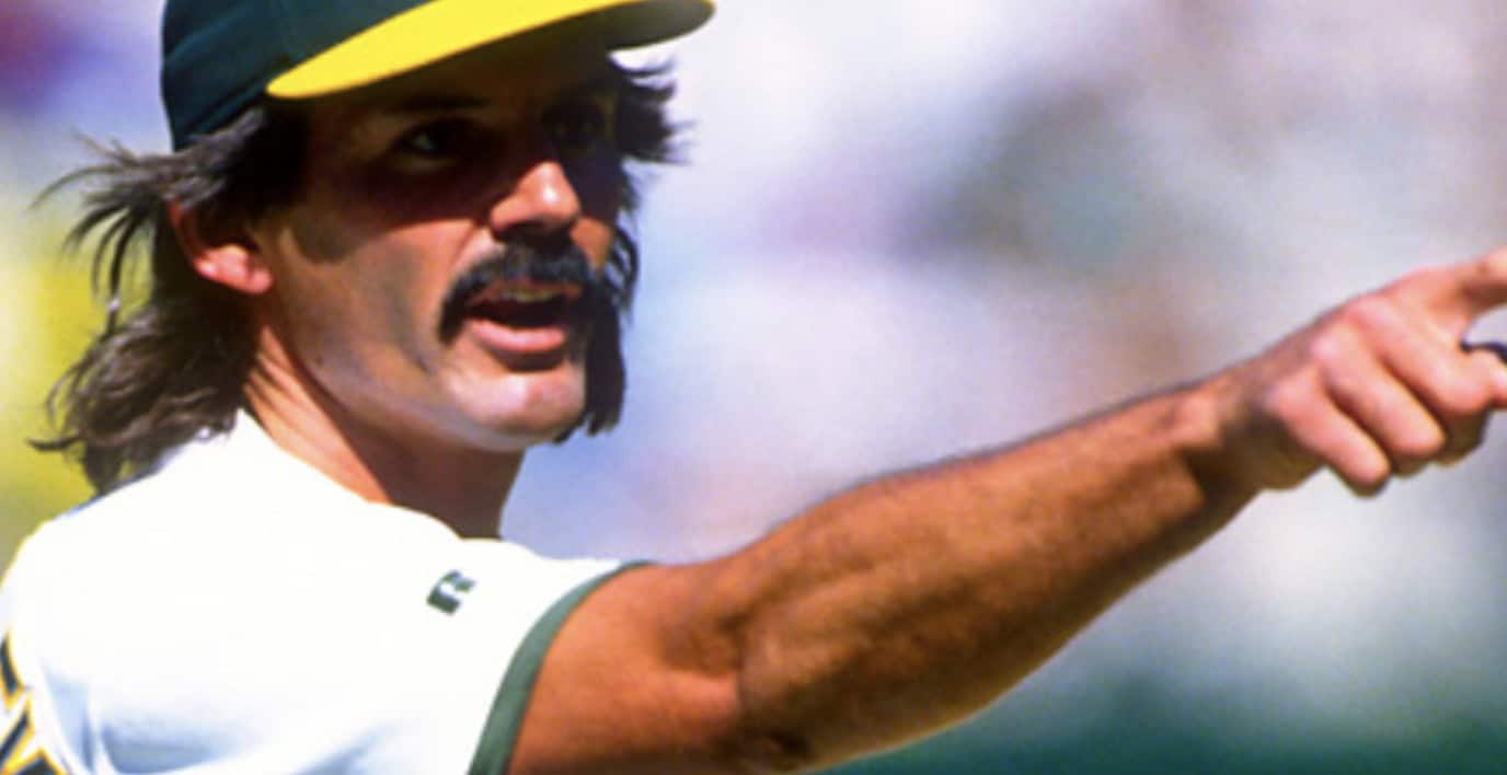 Starter, Closer, Hall of Famer: The Eckersley Paradox 12 Image of Dennis Eckersley celebrating his Hall of Fame induction, showcasing stats.