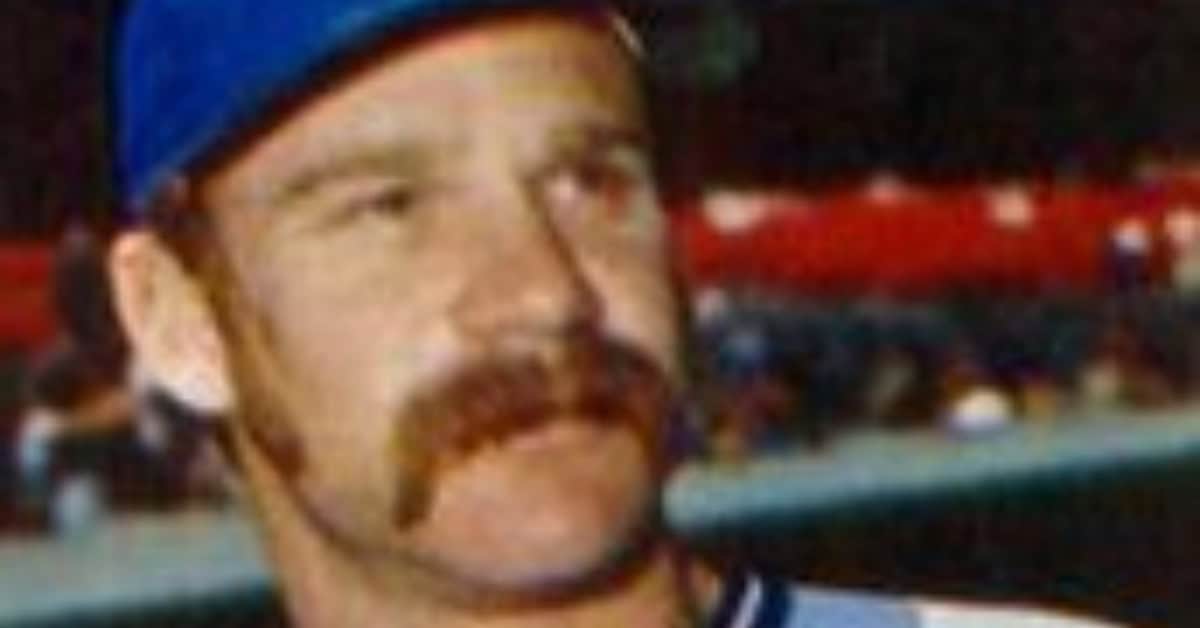 Dennis Leonard delivering a pitch, showcasing his talent as a KC Royals star.