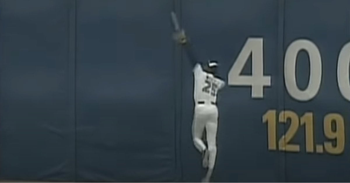 Devon White attempting the famous triangle triple play in the 1992 World Series.