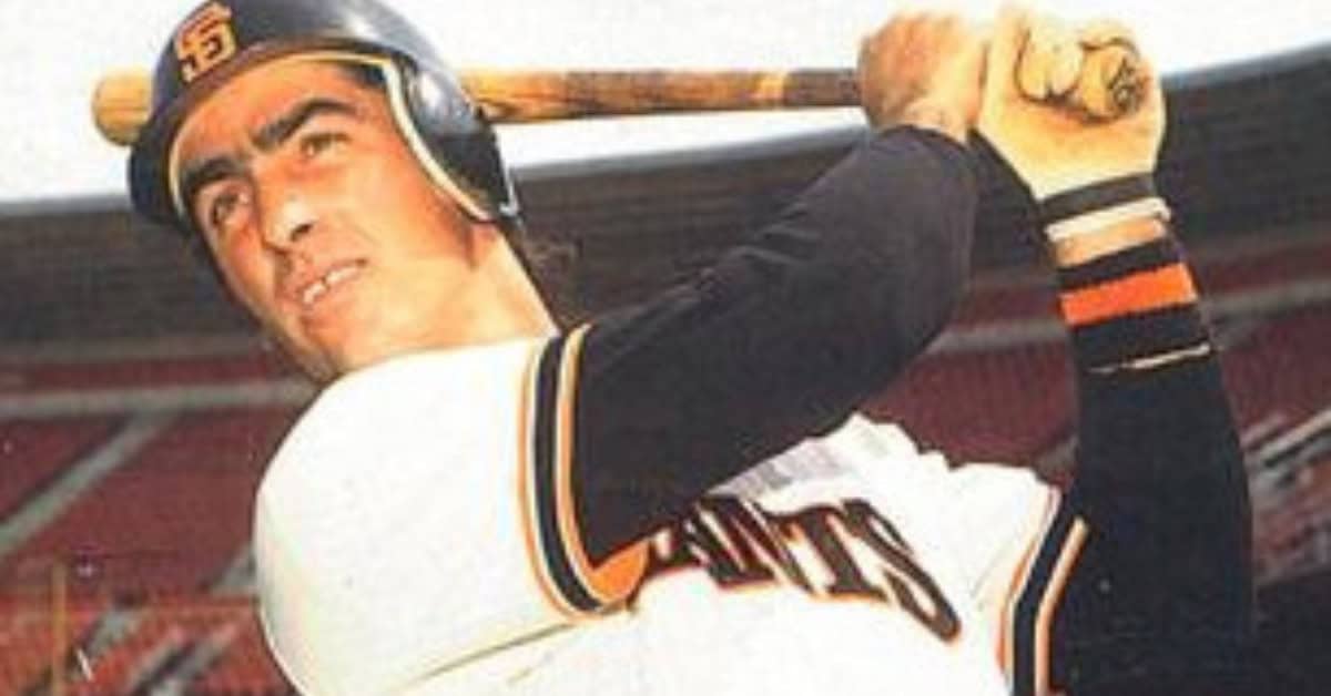 Jack Clark swinging a bat, embodying the fear factor for the Giants.