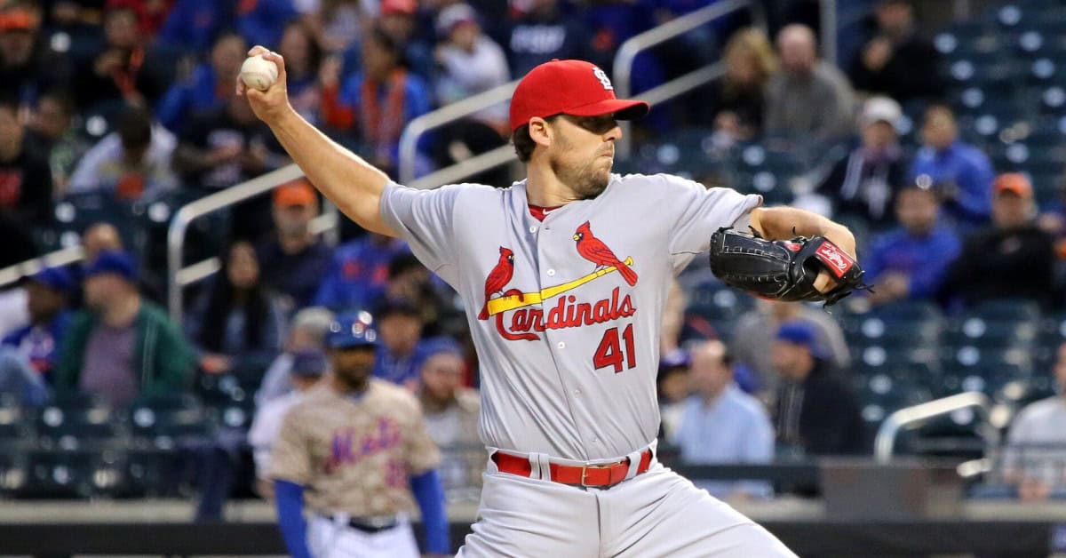 John Lackey in action, highlighting his unusual insurance policy in contracts.