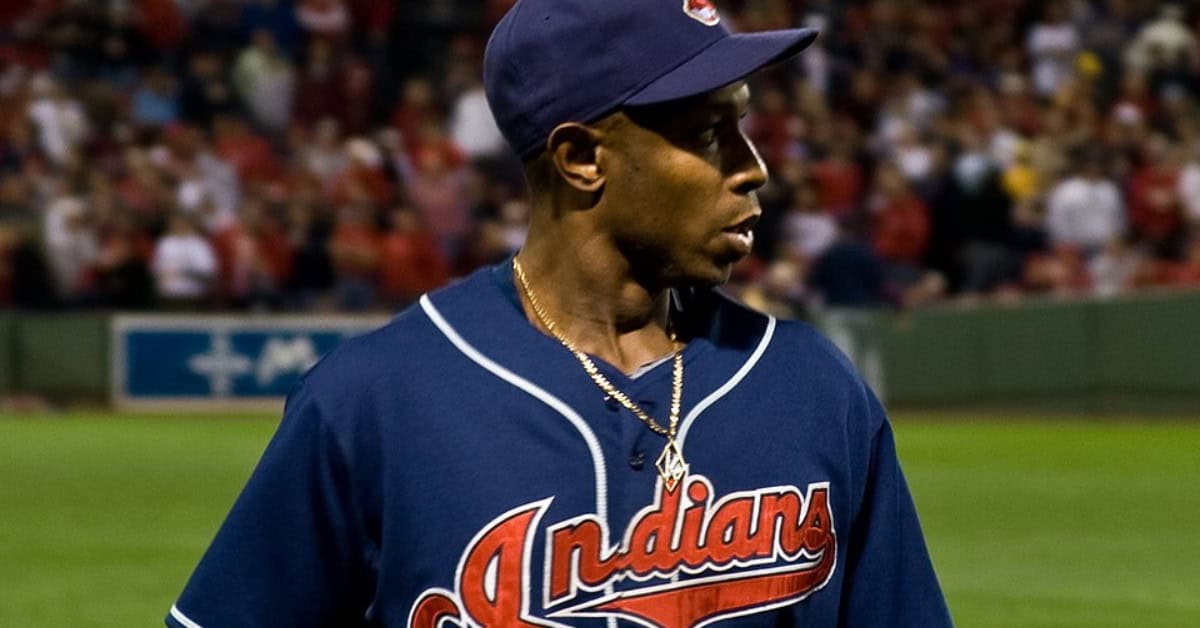 Meet the Stars Baseball Somehow Kept Overlooking 8 Kenny Lofton in action, showcasing his skills as a game-changing center fielder.