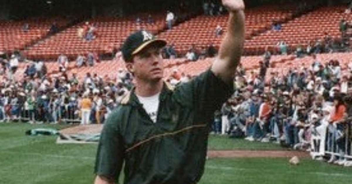 Mark McGwire hitting one of his 49 home runs during his unforgettable rookie season.
