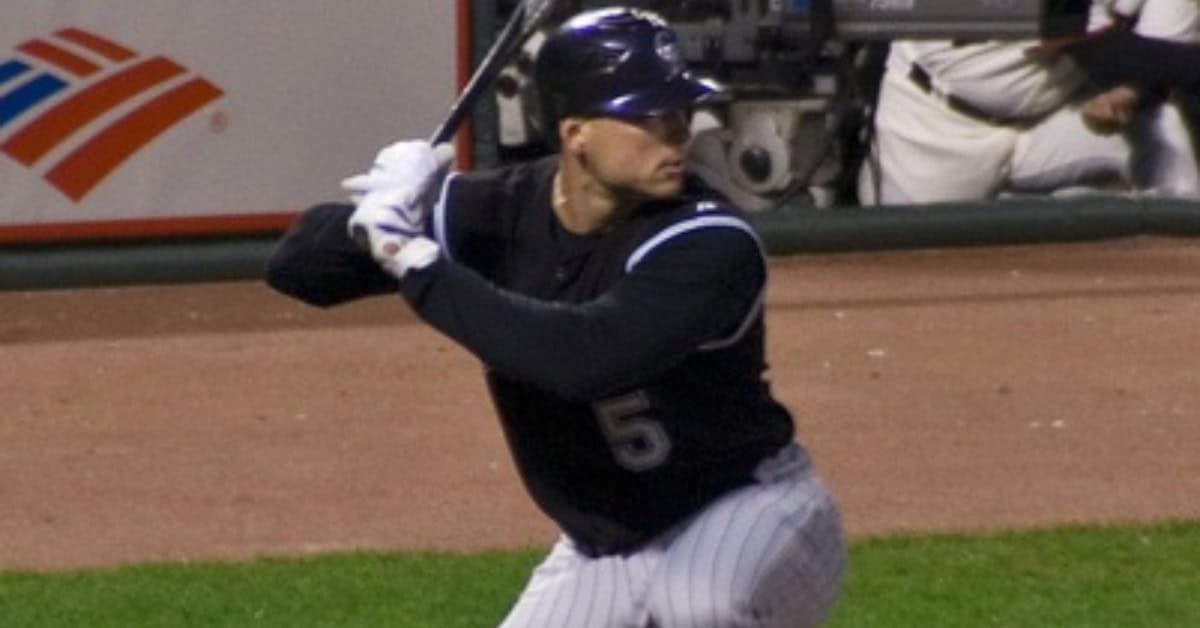 Matt Holliday crossing home plate, a Colorado legend without a plaque.