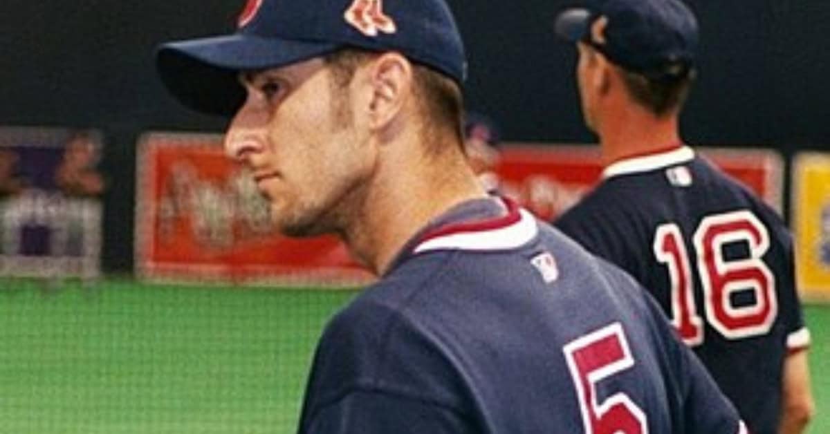The Supporting Cast That Made Pedro Martinez's Career Feel Like Cinema 18 Nomar Garciaparra in action, showcasing his unique batting glove ritual as a Red Sox legend.