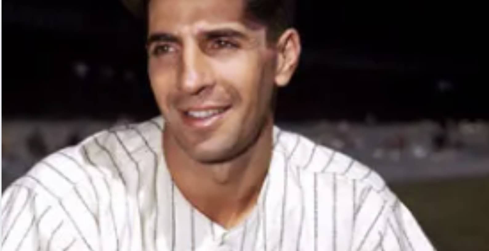 27 Yankees Who Made the Pinstripes Mean Something 19 Phil Rizzuto in action, showcasing his skills as a key player in 1940s baseball.