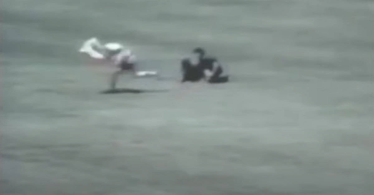 Rick Monday heroically saves an American flag during a game in 1976.