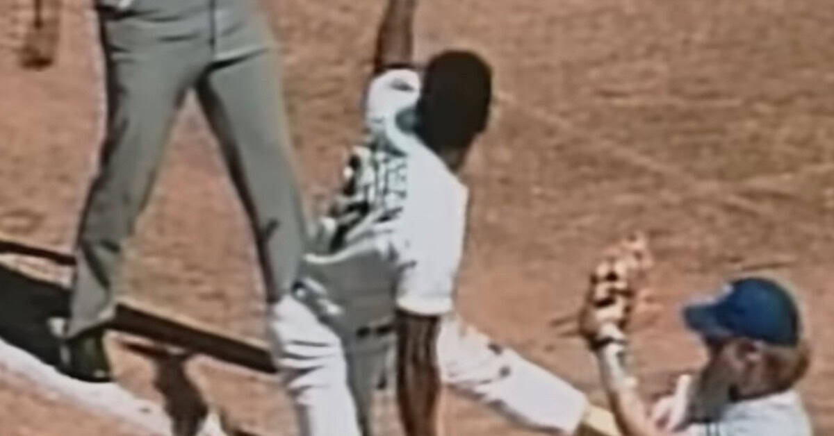 Rickey Henderson steals a base in the 1989 ALCS, showcasing his game-changing impact on baseball.