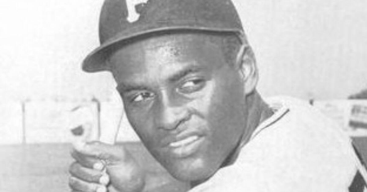 Roberto Clemente in action, symbolizing his impact on baseball and culture.