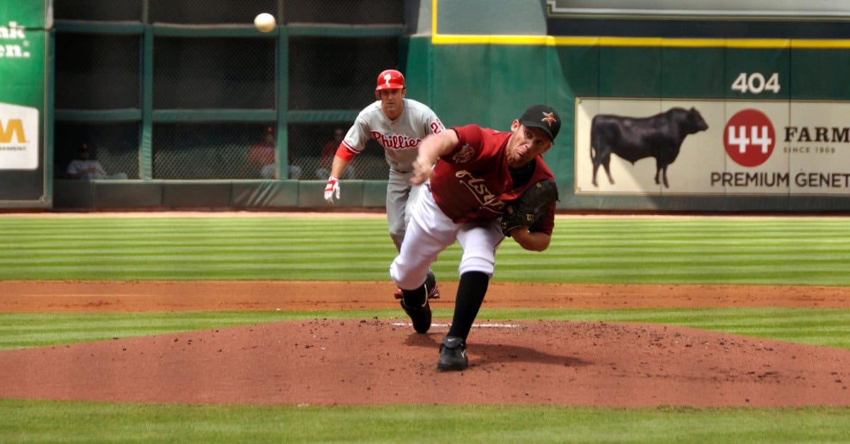 Roy Oswalt in action, representing the Astros, highlighted in "From Colt .45s to Killer B's."