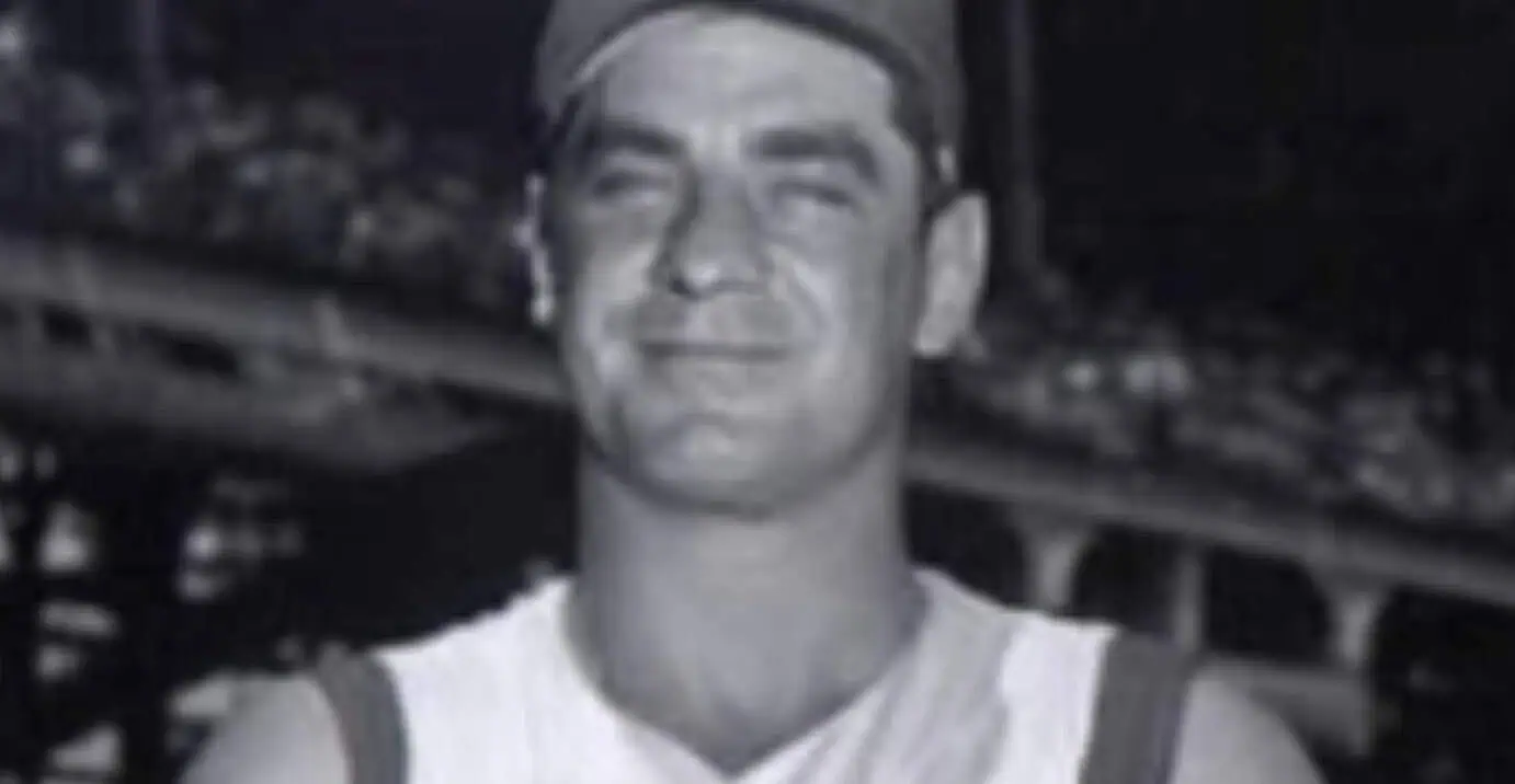 Meet Big Klu: The Forgotten Slugger Who Made Today's Power Hitters Look Timid 3 Ted Kluszewski in action, showcasing his powerful swing and iconic sleeveless jersey.