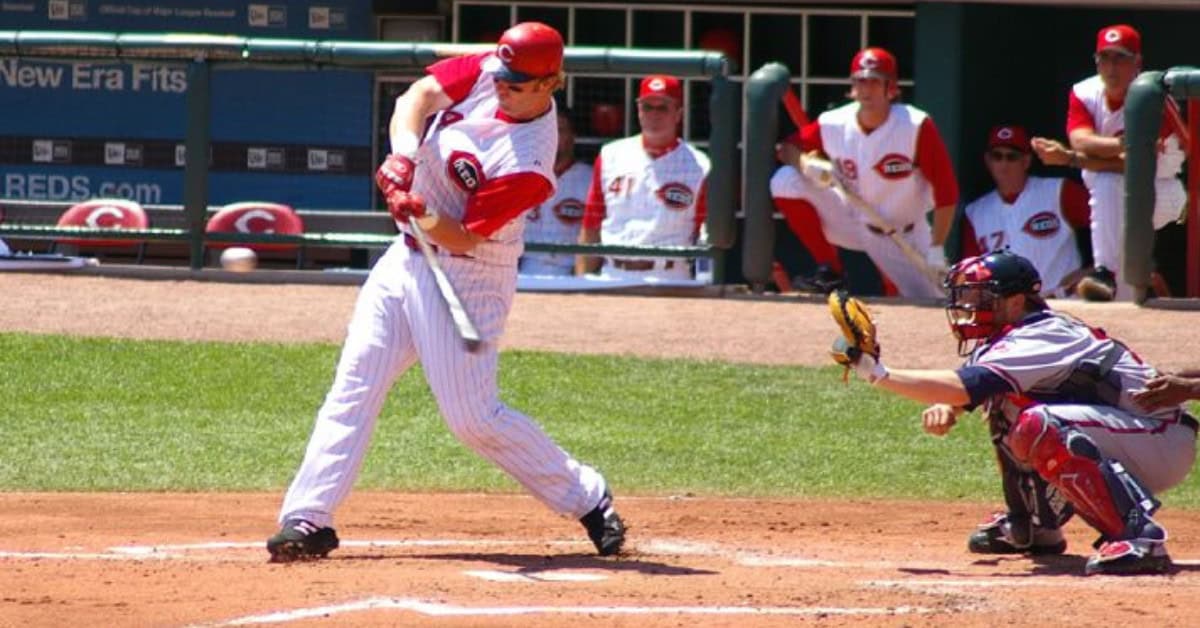 Adam Dunn, known as "The Big Donkey," delivers a powerful swing during a game.
