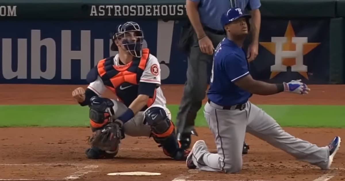 10 Times Adrian Beltre Made a Third Baseman Look Like a Superhero 5 Adrian Beltre hits a one-knee home run, showcasing his unique style in the Lone Star Rivalry.