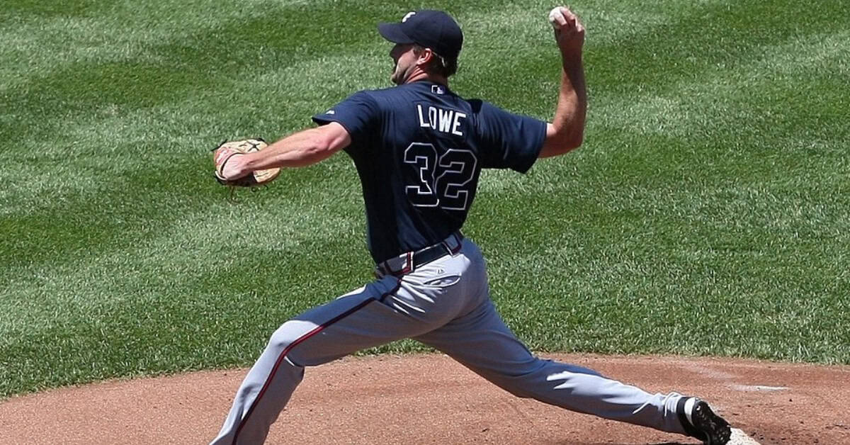 The Supporting Cast That Made Pedro Martinez's Career Feel Like Cinema 13 Derek Lowe in action, showcasing his sinker pitch that turned fly balls into easy outs.