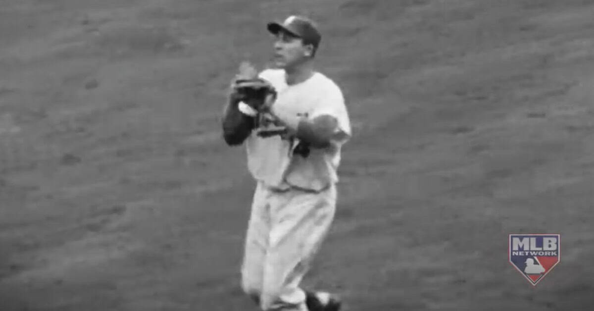 Gil Hodges Waited 50 Years for Cooperstown. Why Did It Take So Long? 4 Gil Hodges making a play in the field, showcasing his defensive prowess and stats.