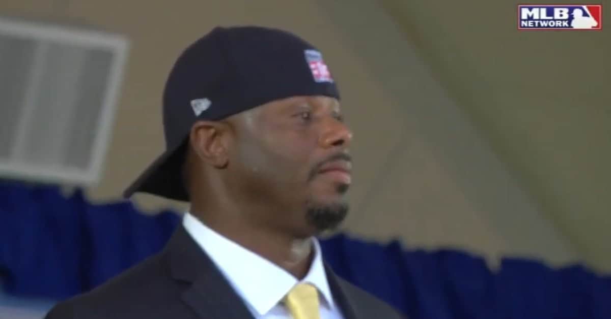 Ken Griffey Jr. wearing his iconic backward cap during Hall of Fame induction.