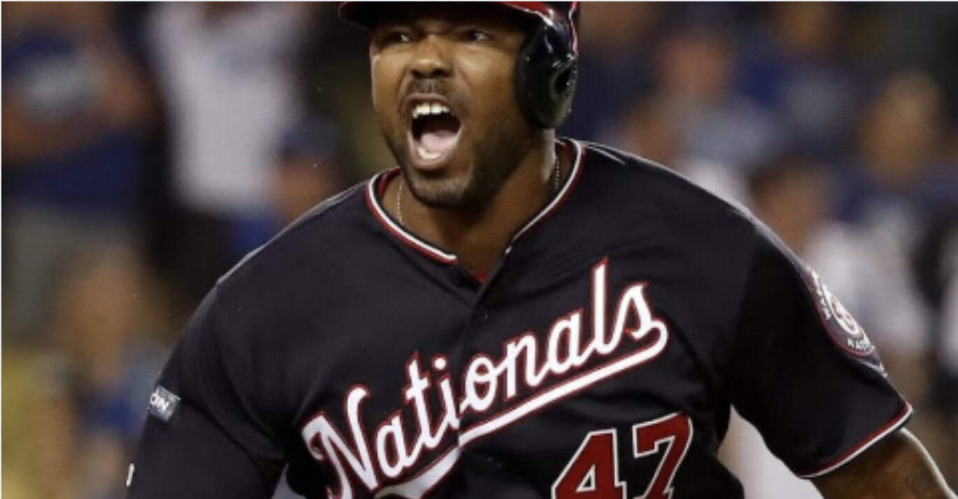 Howie Kendrick making a crucial play, exemplifying steady performance in the 2010s.