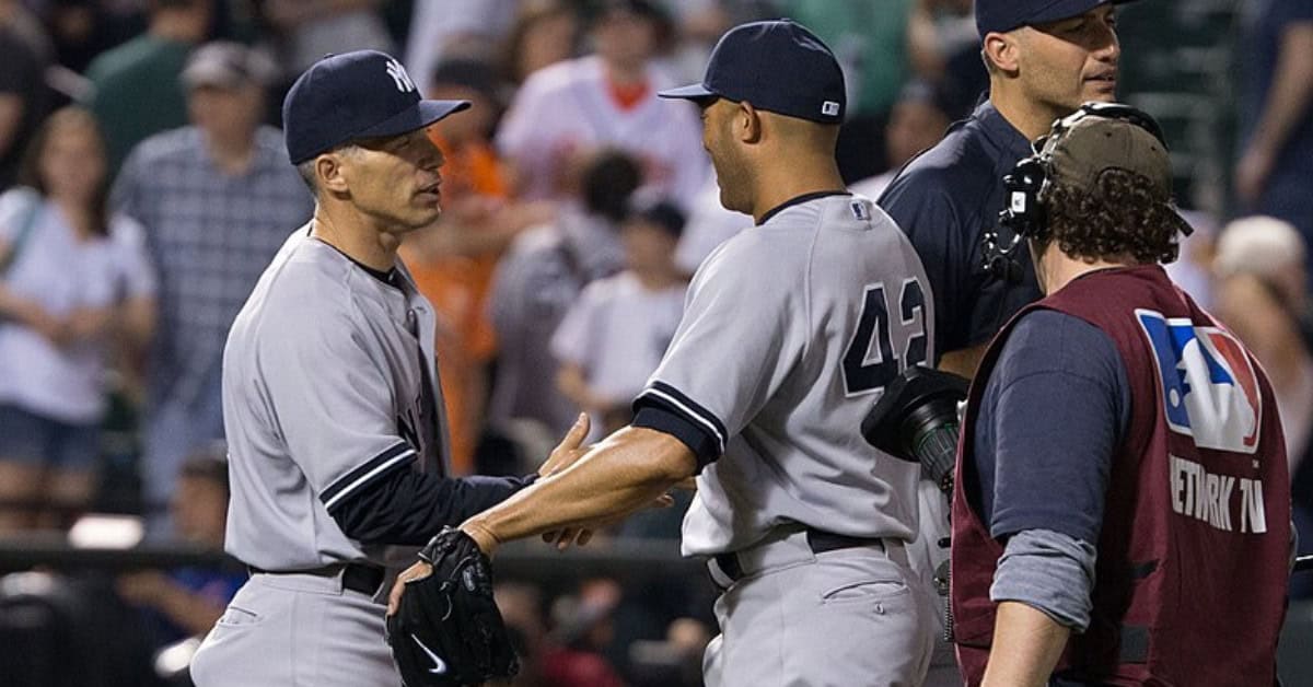 Joe Girardi and Mariano Rivera during their time with the Yankees, showcasing their legacy.