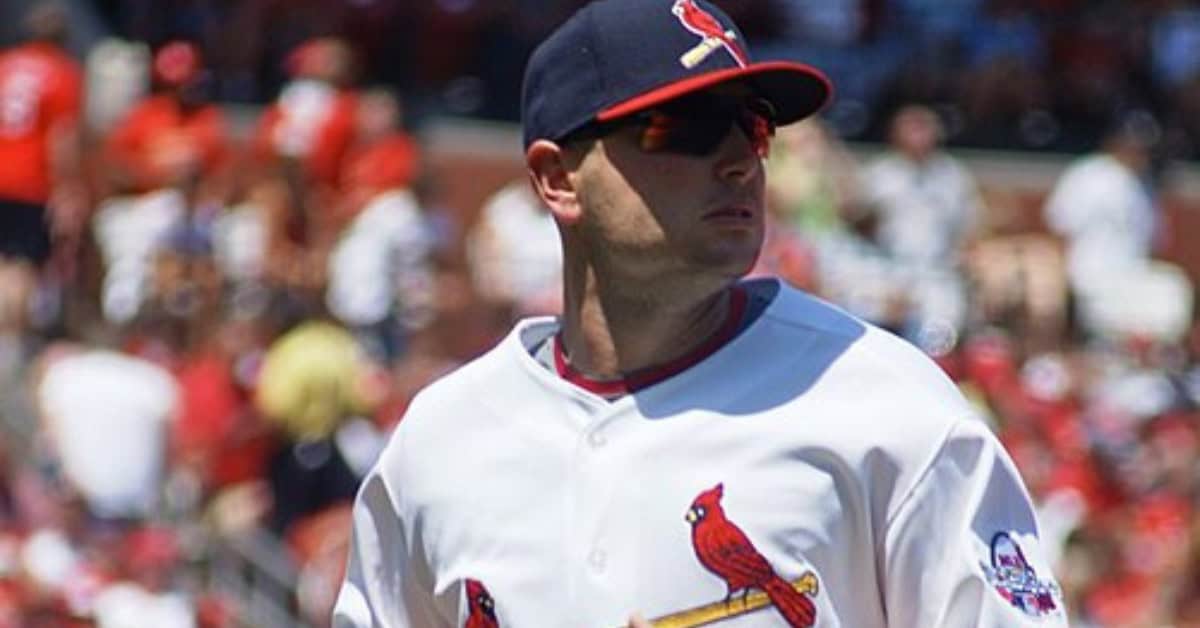 Matt Holliday slides into home plate, a moment still debated by Cubs fans.