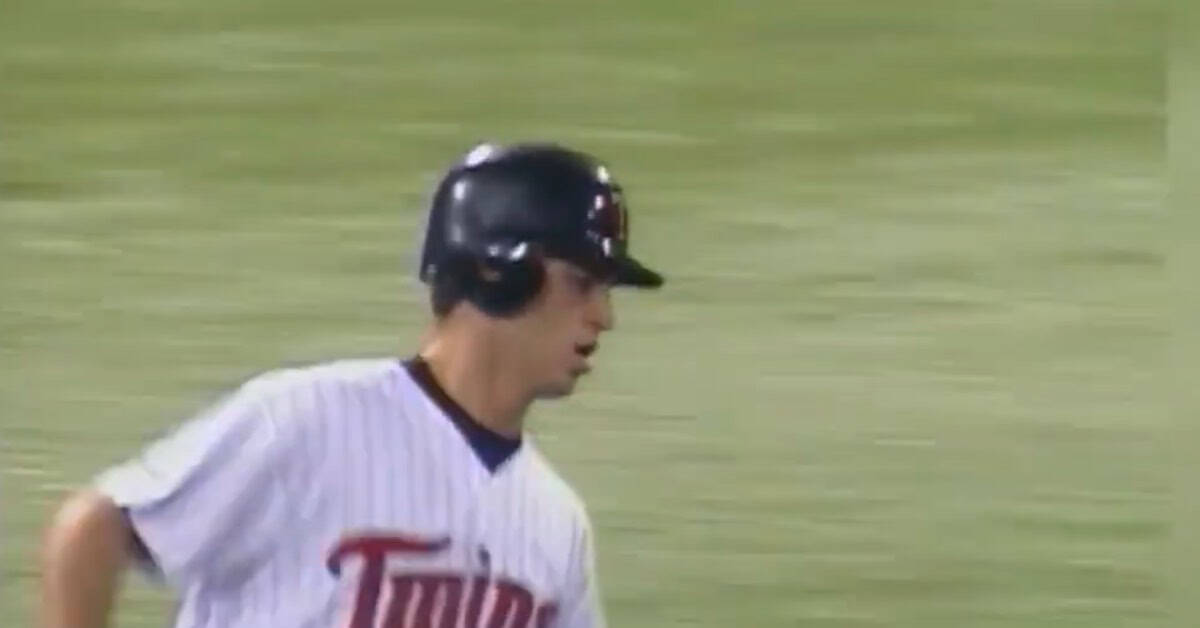 25 Minnesota Twins Worth Remembering 20 Joe Mauer sprinting on the field, showcasing his athleticism and success.