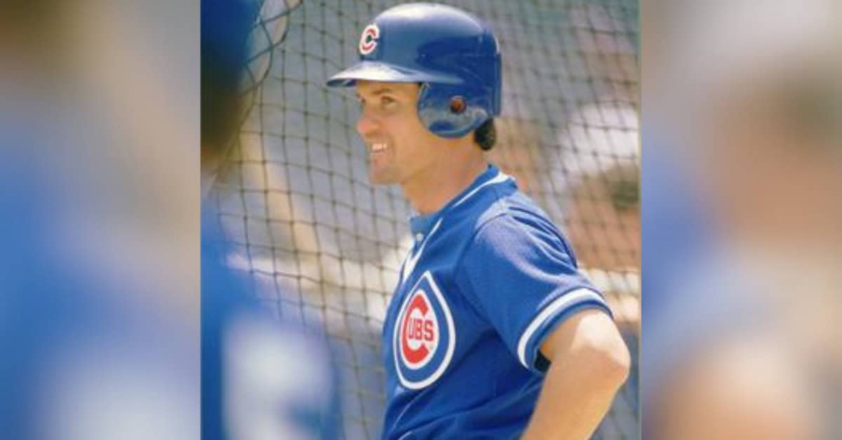 Ryne Sandberg swings during a game, embodying the complexities of his career.