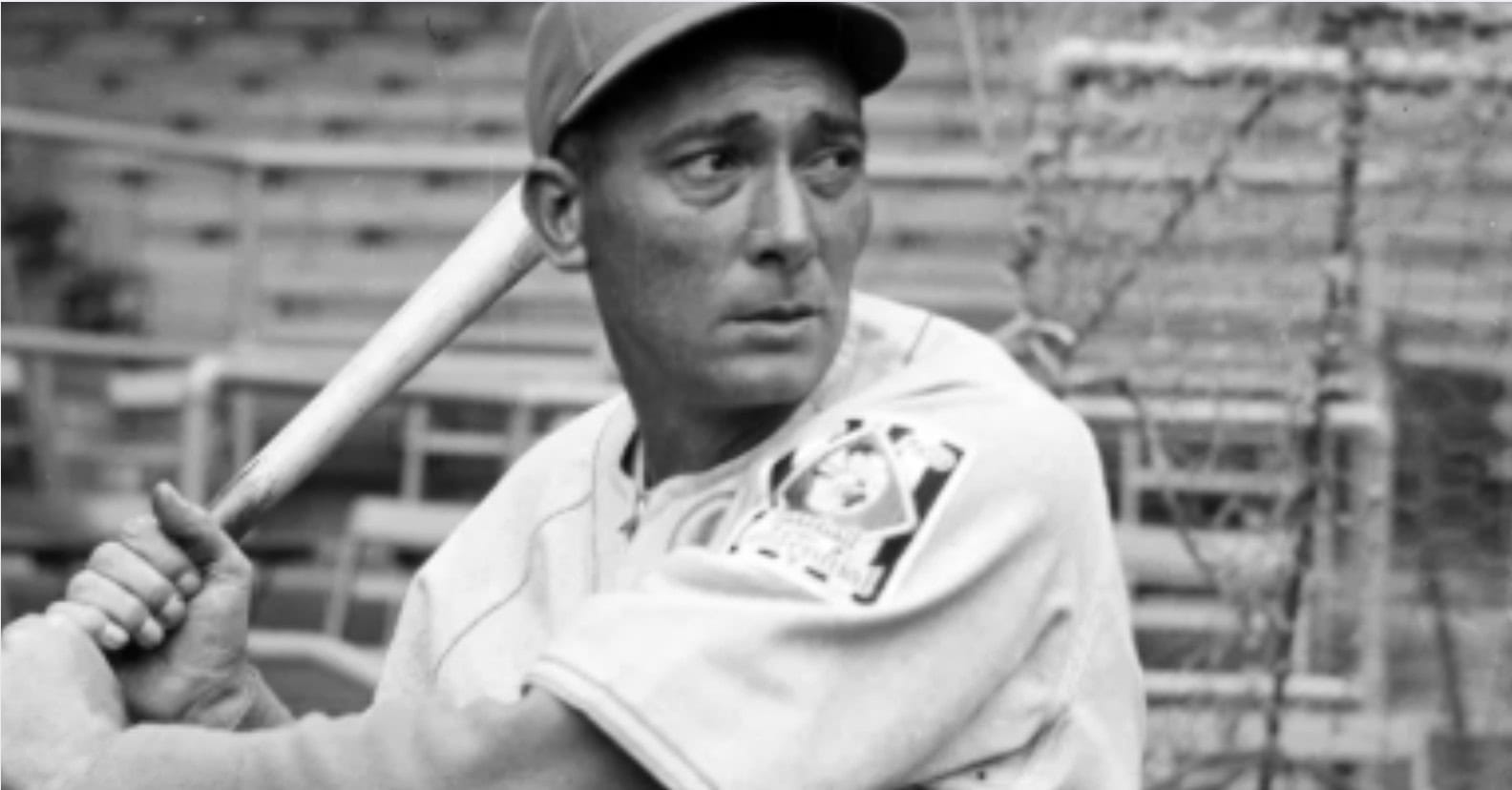 27 Yankees Who Made the Pinstripes Mean Something 7 Tony Lazzeri hitting during his record-setting game with 11 RBIs, showcasing MLB history.