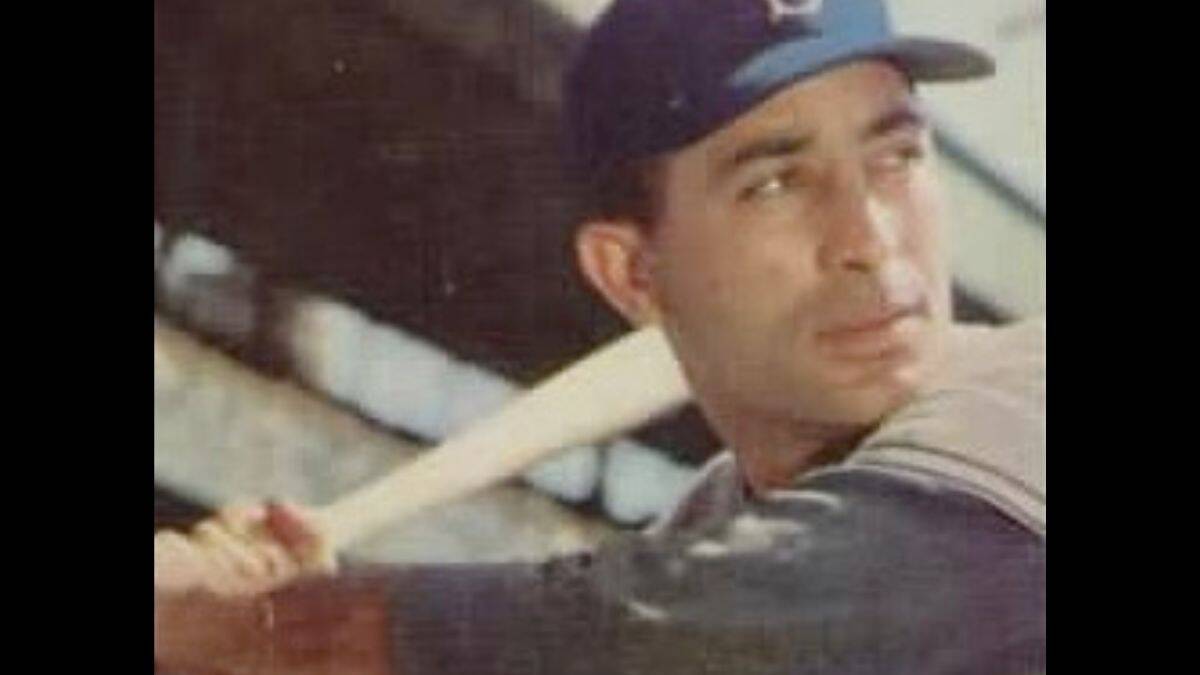 Meet the 20 Men Who Shared a Dugout With Sandy Koufax 7 Carl Furillo, known as "The Reading Rifle," showcases his skills as a right fielder.