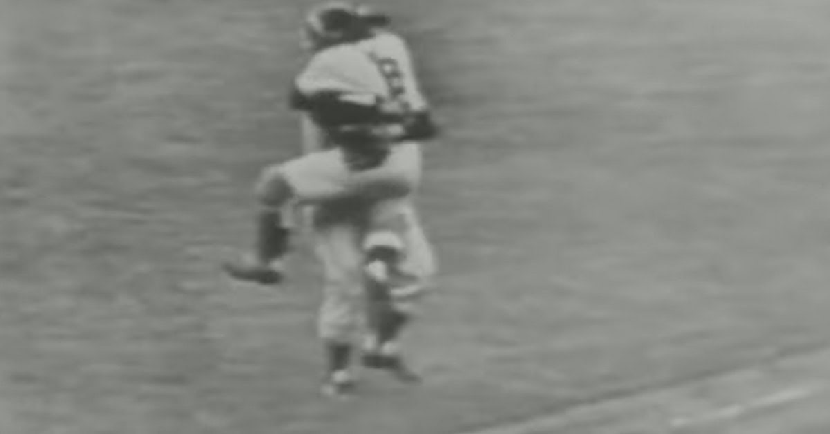 12 Plays from Baseball's Golden Age That Still Give Us Chills 6 Don Larsen celebrates his perfect game with Yogi Berra during the 1956 World Series.